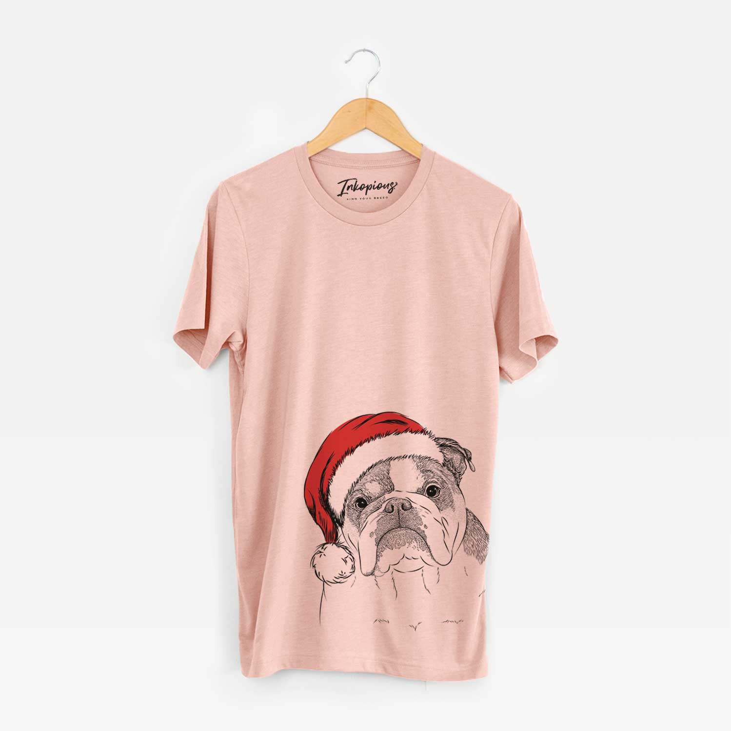 Hand-drawn sketch of Jack the English Bulldog wearing a Santa hat on a Peach Unisex crewneck
