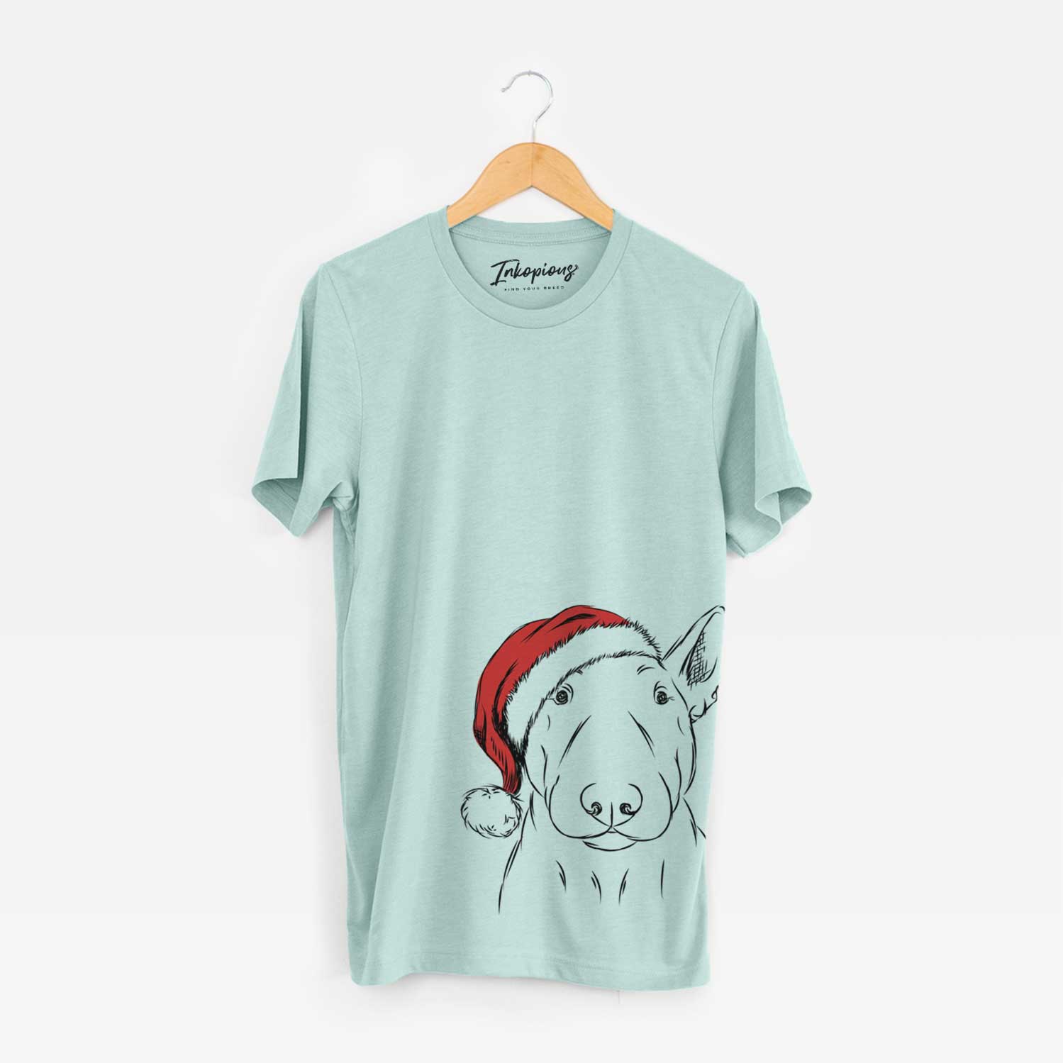 Hand-drawn sketch of Jett the Bull Terrier wearing a Santa hat on a Heather Sage Unisex crewneck