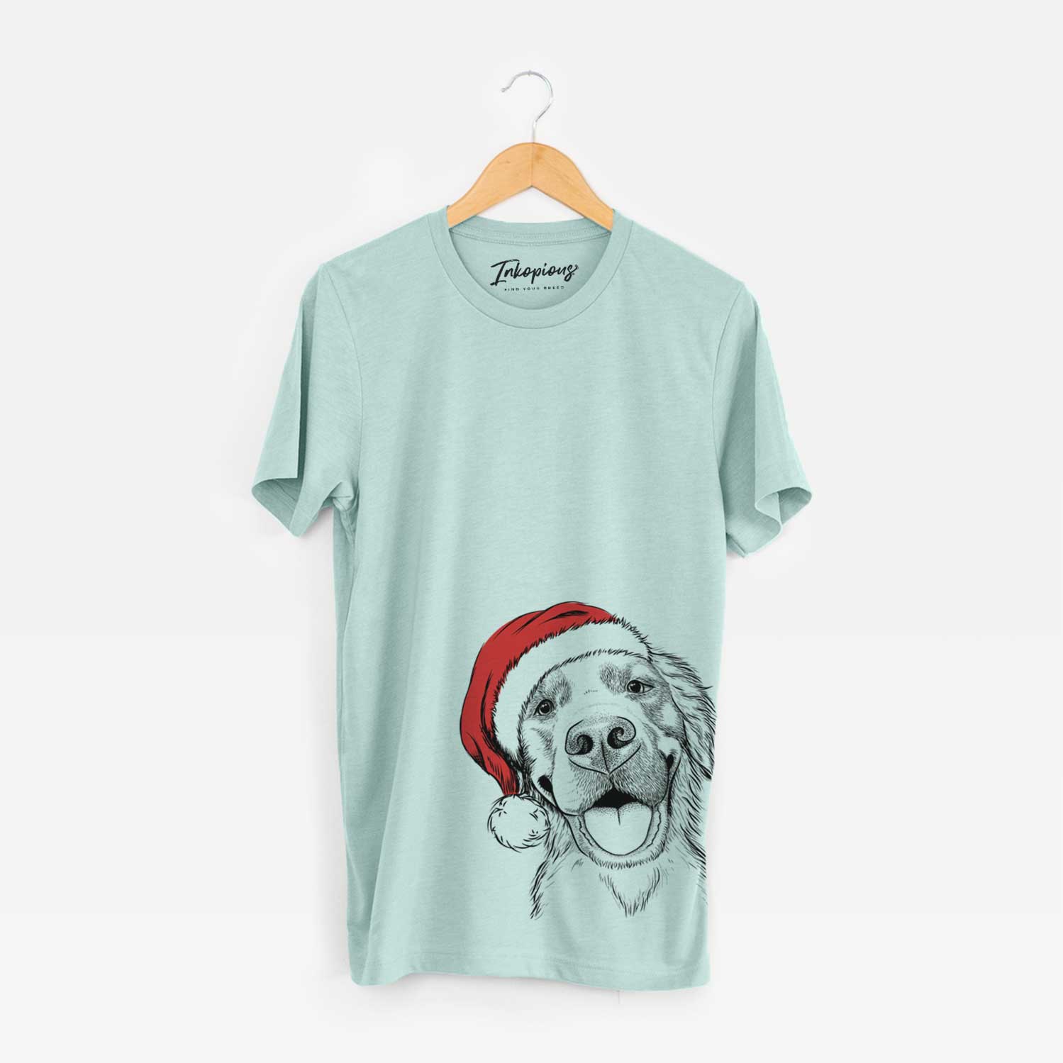 Hand-drawn sketch of Jordy the Golden Retriever wearing a Santa hat on a Heather Sage Unisex crewneck