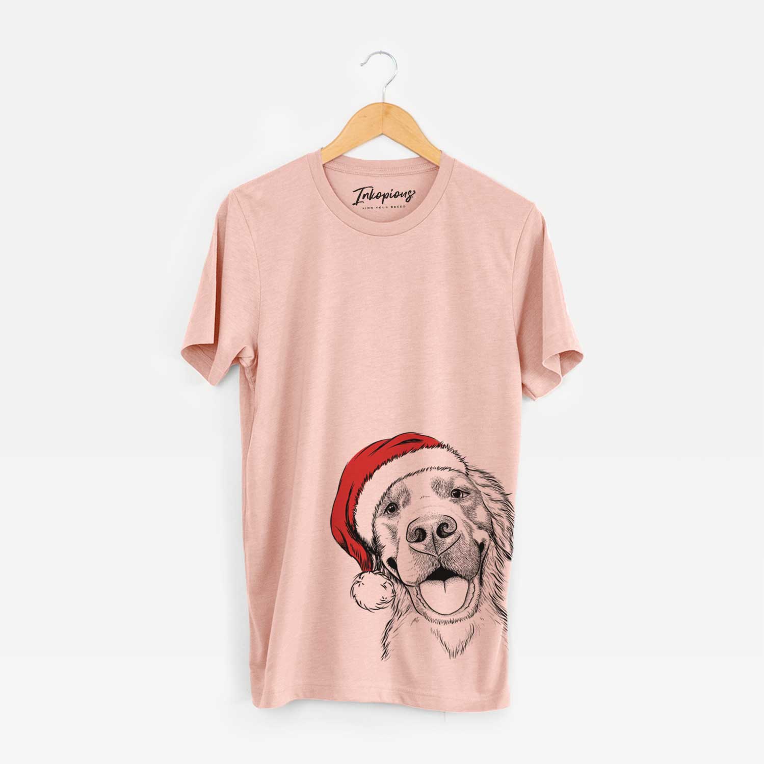 Hand-drawn sketch of Jordy the Golden Retriever wearing a Santa hat on a Peach Unisex crewneck