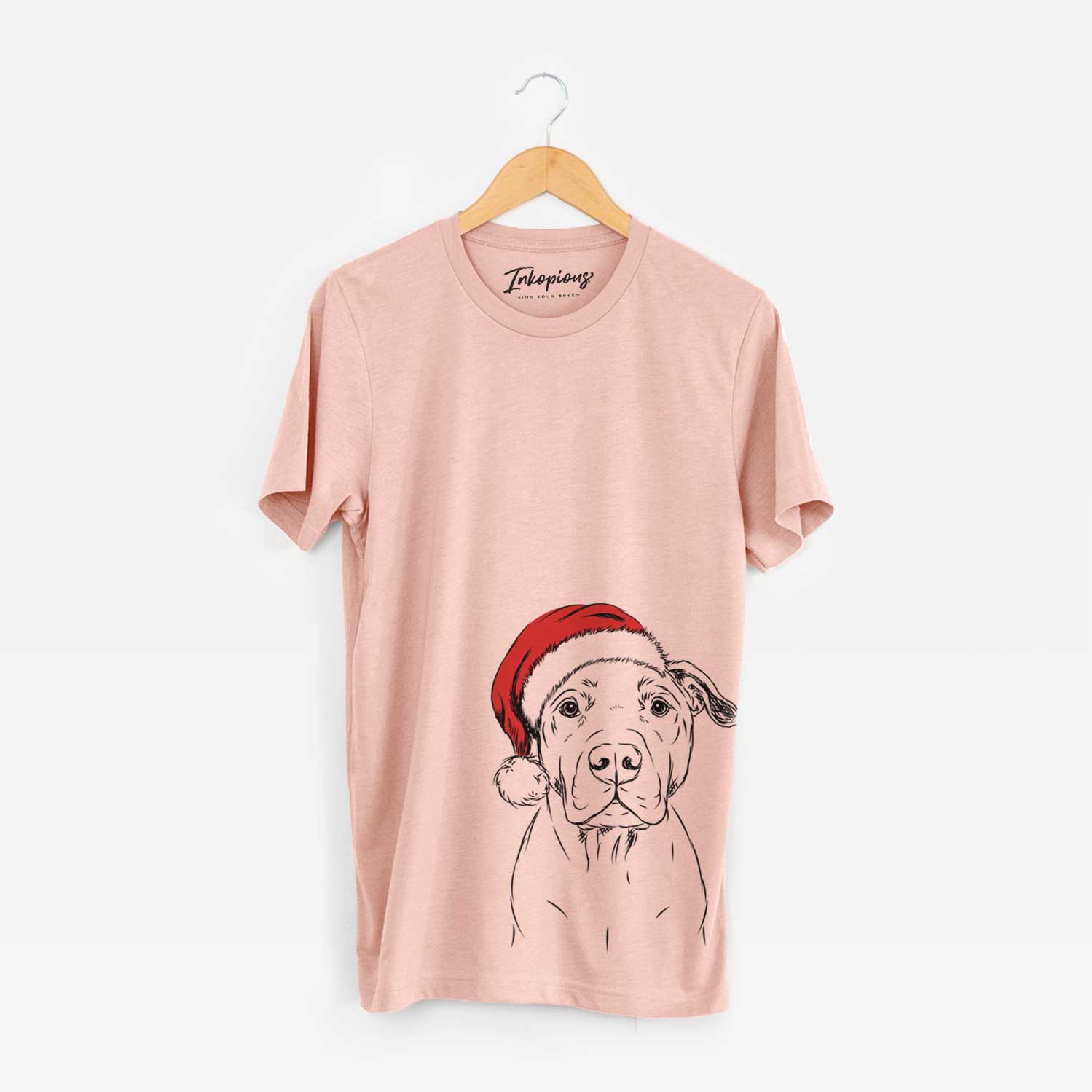 Hand-drawn sketch of Kadin the Pitbull wearing a Santa hat on a Peach Unisex crewneck