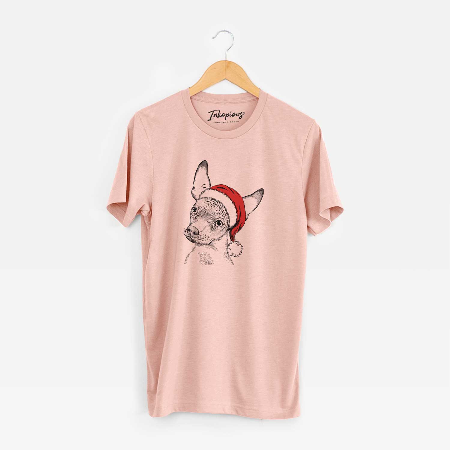 Hand-drawn sketch of Kahlo the Xoloitzcuintli wearing a Santa hat on a Peach Unisex crewneck