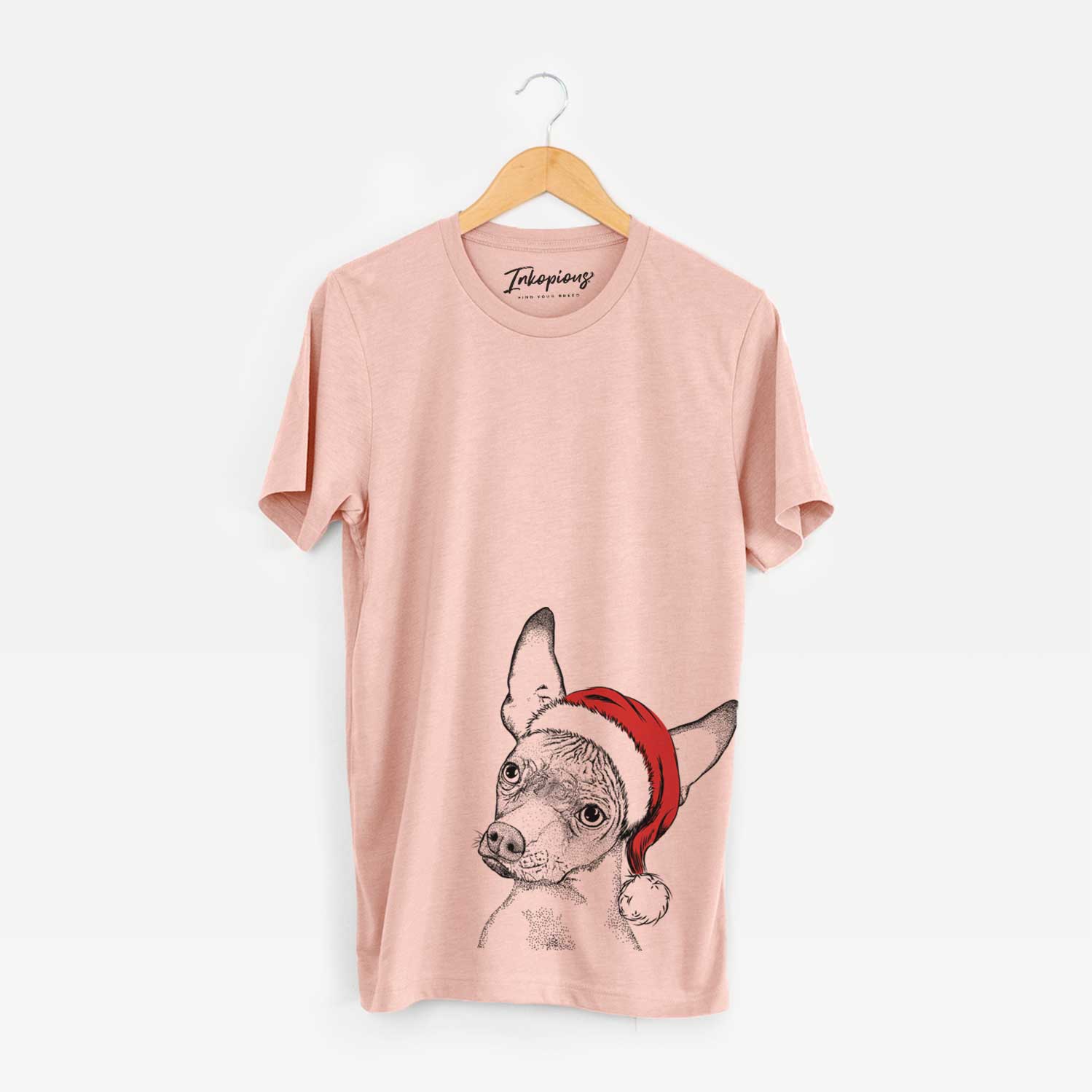 Hand-drawn sketch of Kahlo the Xoloitzcuintli wearing a Santa hat on a Peach Unisex crewneck
