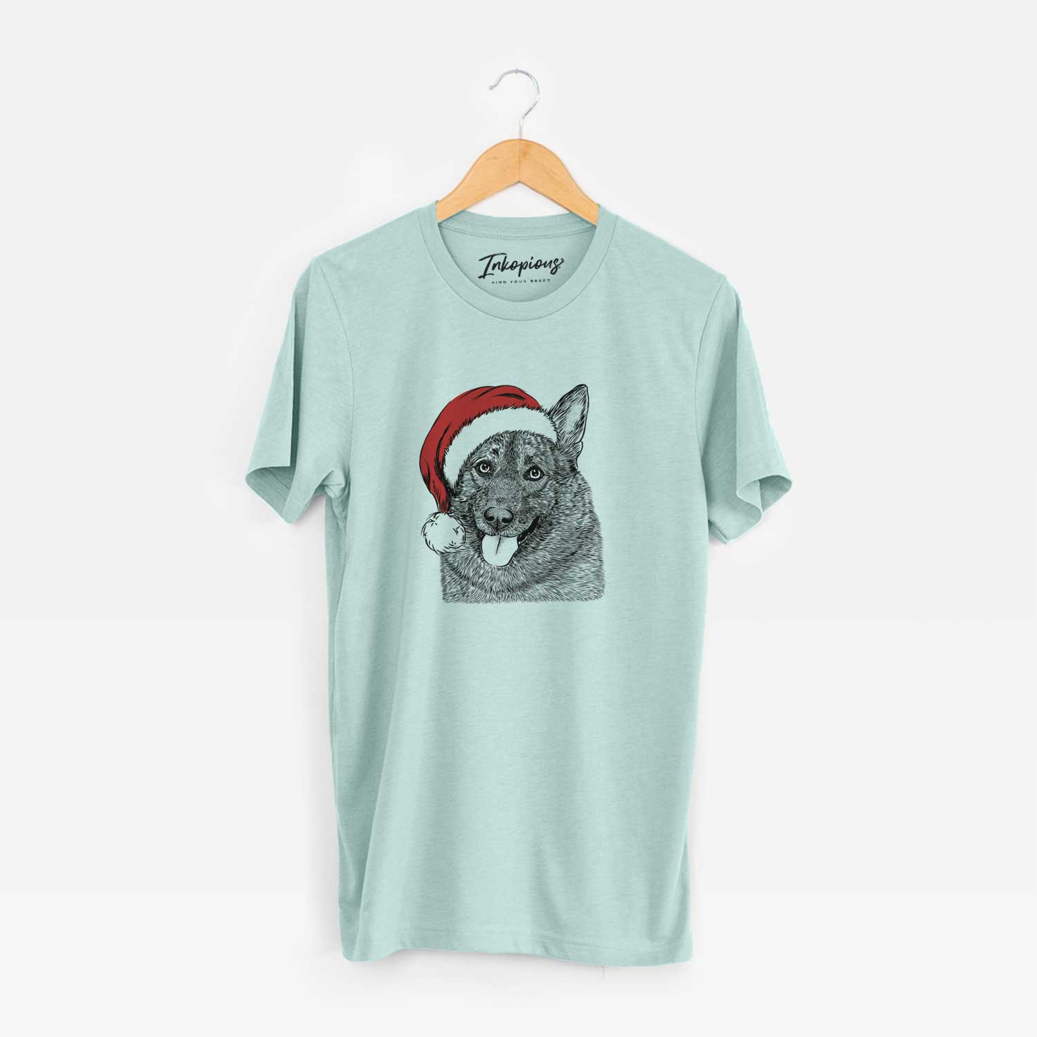 Hand-drawn sketch of Kasia the Norwegian Elkhound wearing a Santa hat on a Heather Sage Unisex crewneck
