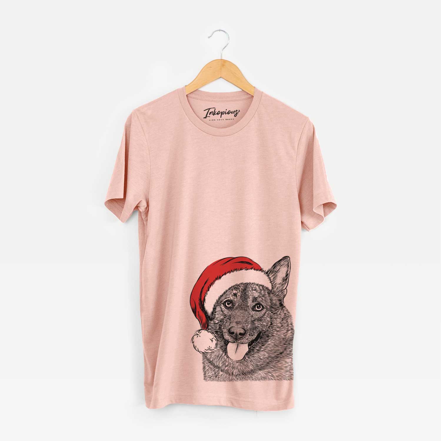 Hand-drawn sketch of Kasia the Norwegian Elkhound wearing a Santa hat on a Peach Unisex crewneck