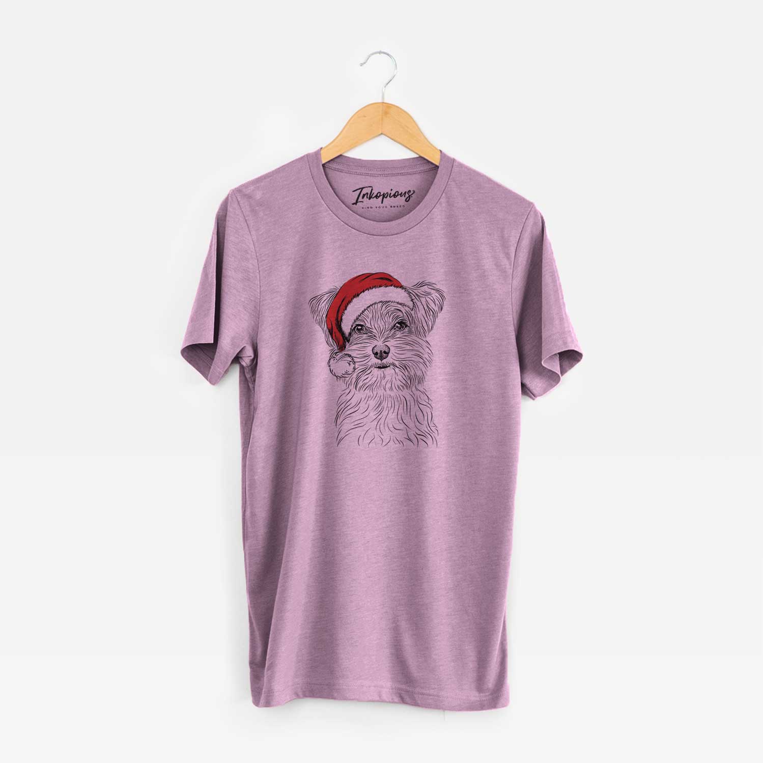 Hand-drawn sketch of Kiwi the Morkie wearing a Santa hat on an Orchid Unisex crewneck