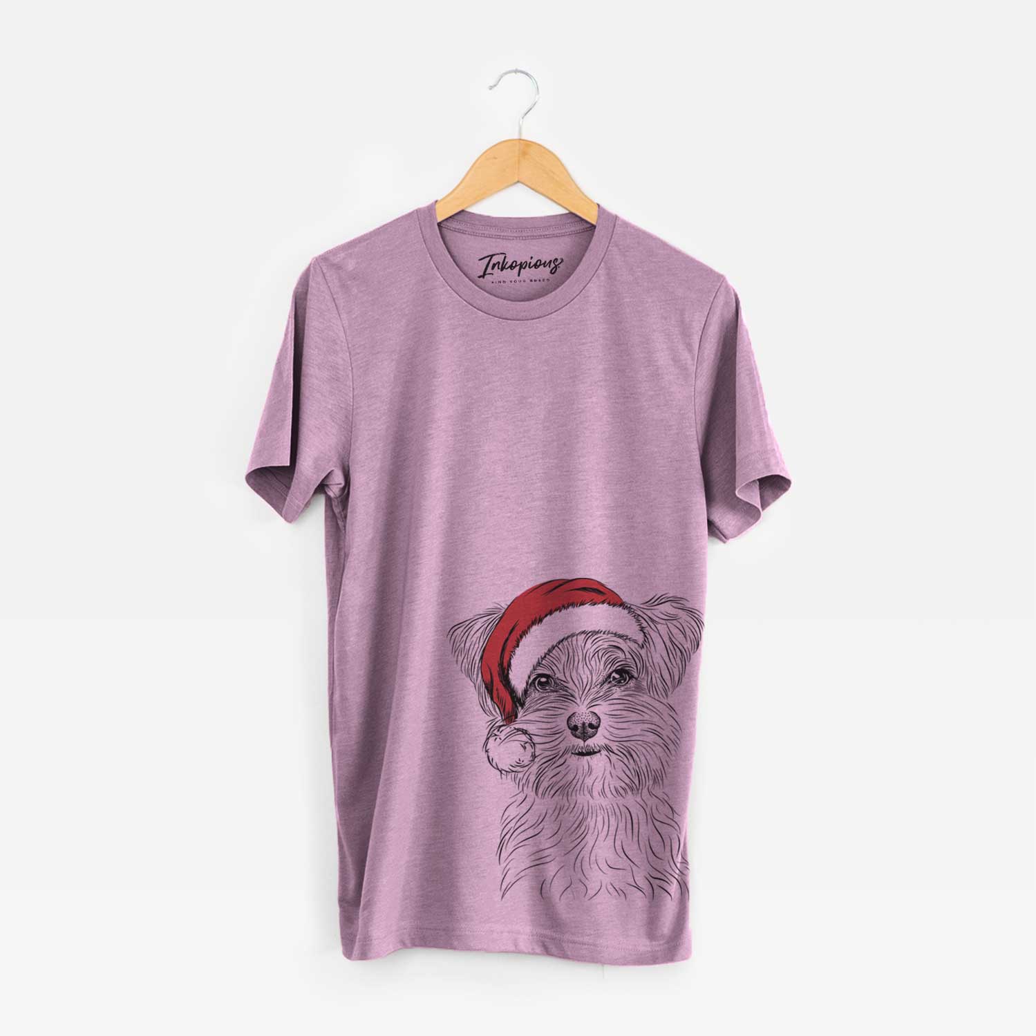 Hand-drawn sketch of Kiwi the Morkie wearing a Santa hat on an Orchid Unisex crewneck