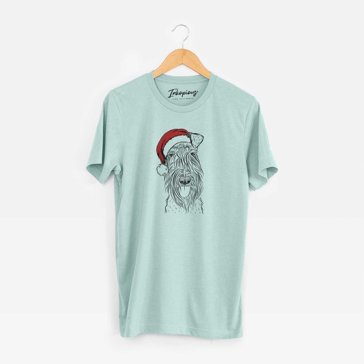 Hand-drawn sketch of Kricket the Kerry Blue Terrier wearing a Santa hat on a Heather Sage Unisex crewneck