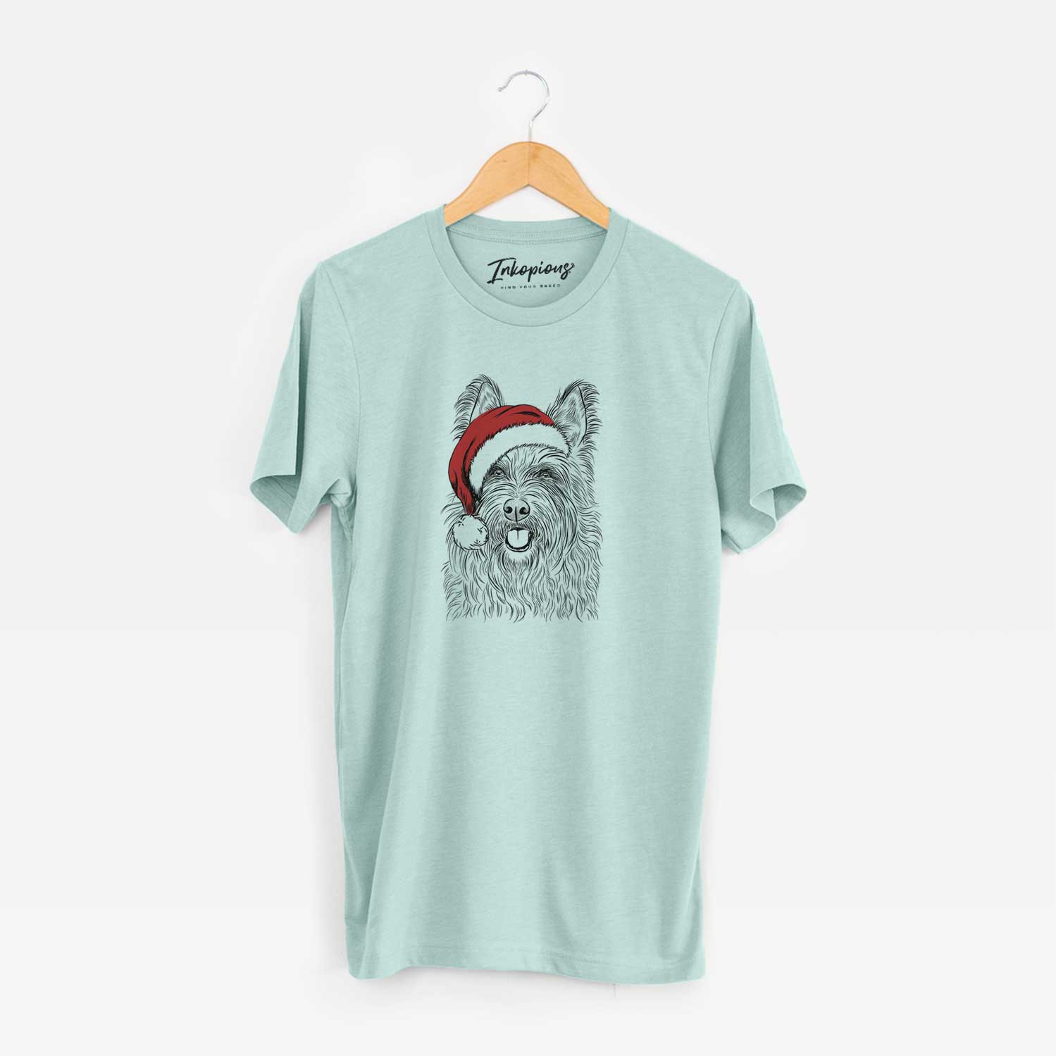 Hand-drawn sketch of Kyros the Berger Picard wearing a Santa hat on a Heather Sage Unisex crewneck