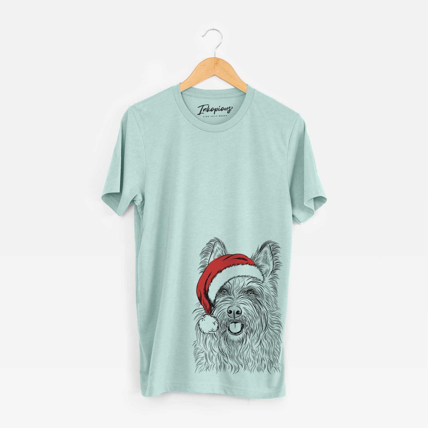 Hand-drawn sketch of Kyros the Berger Picard wearing a Santa hat on a Heather Sage Unisex crewneck