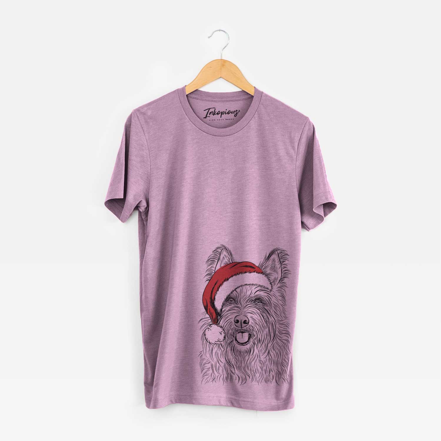 Hand-drawn sketch of Kyros the Berger Picard wearing a Santa hat on an Orchid Unisex crewneck
