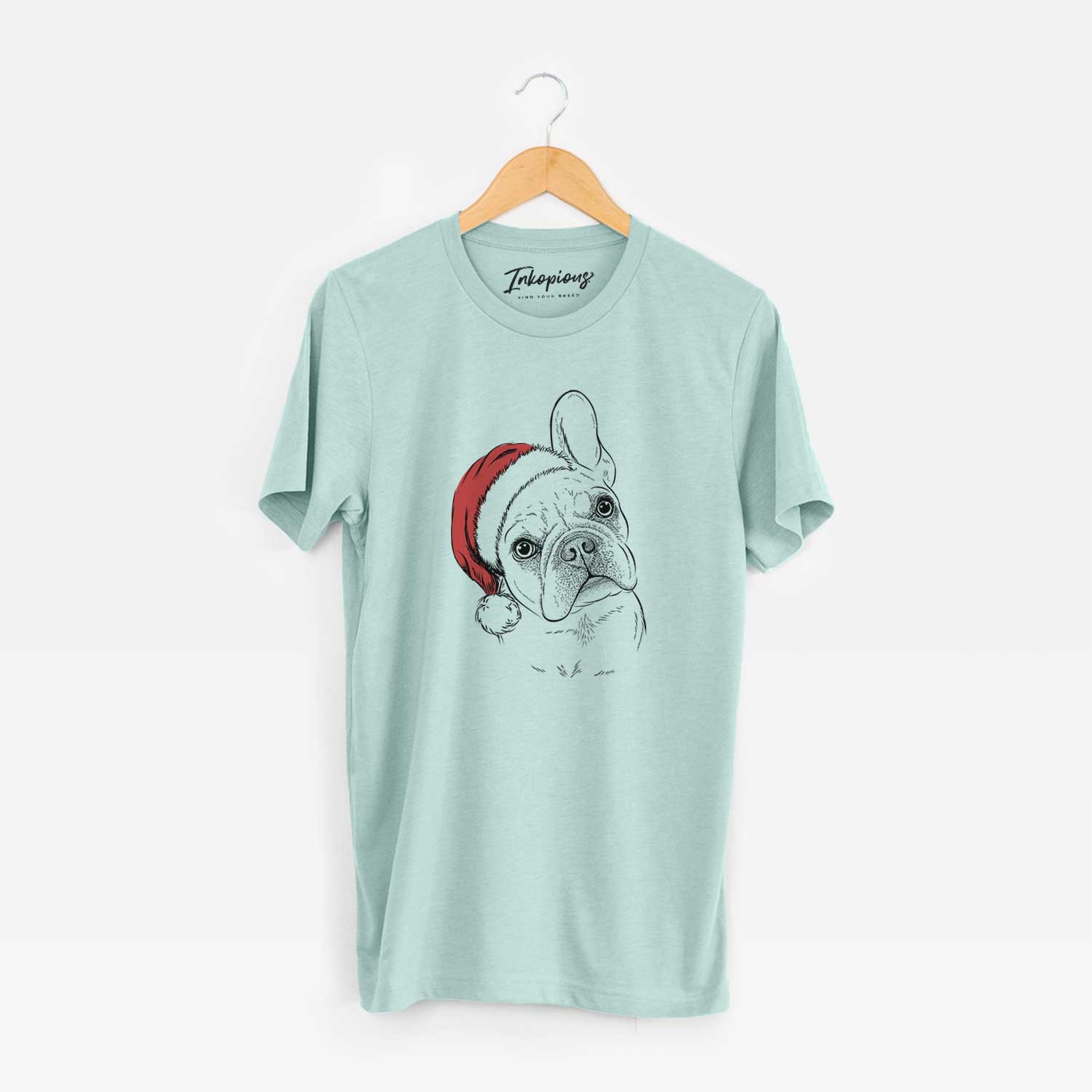 Hand-drawn sketch of Loki the French Bulldog wearing a Santa hat on a Heather Sage Unisex crewneck