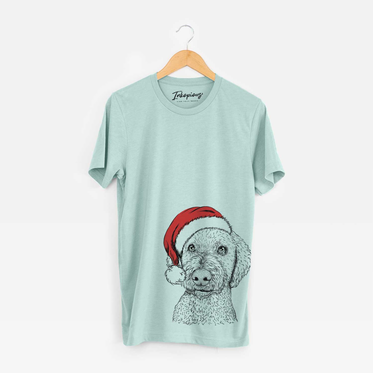 Hand-drawn sketch of Lucy Boo the Goldendoodle wearing a Santa hat on a Heather Sage Unisex crewneck
