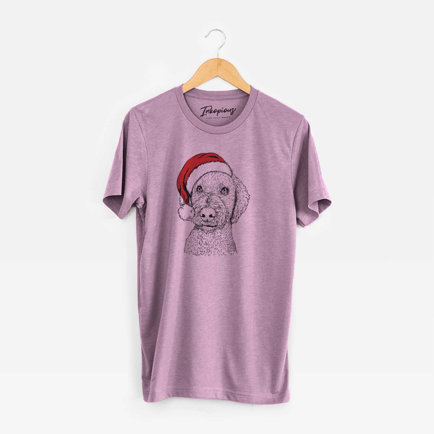 Hand-drawn sketch of Lucy Boo the Goldendoodle wearing a Santa hat on an Orchid Unisex crewneck