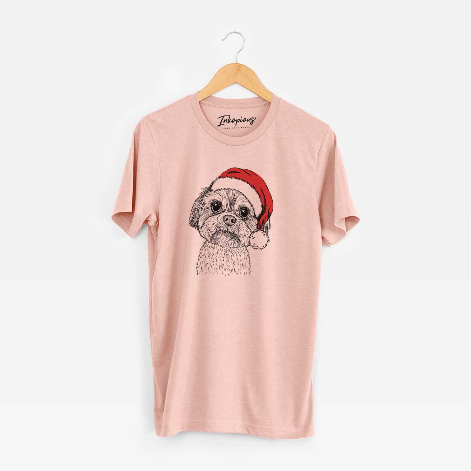 Hand-drawn sketch of Lucy the Shorkie wearing a Santa hat on a Peach Unisex crewneck