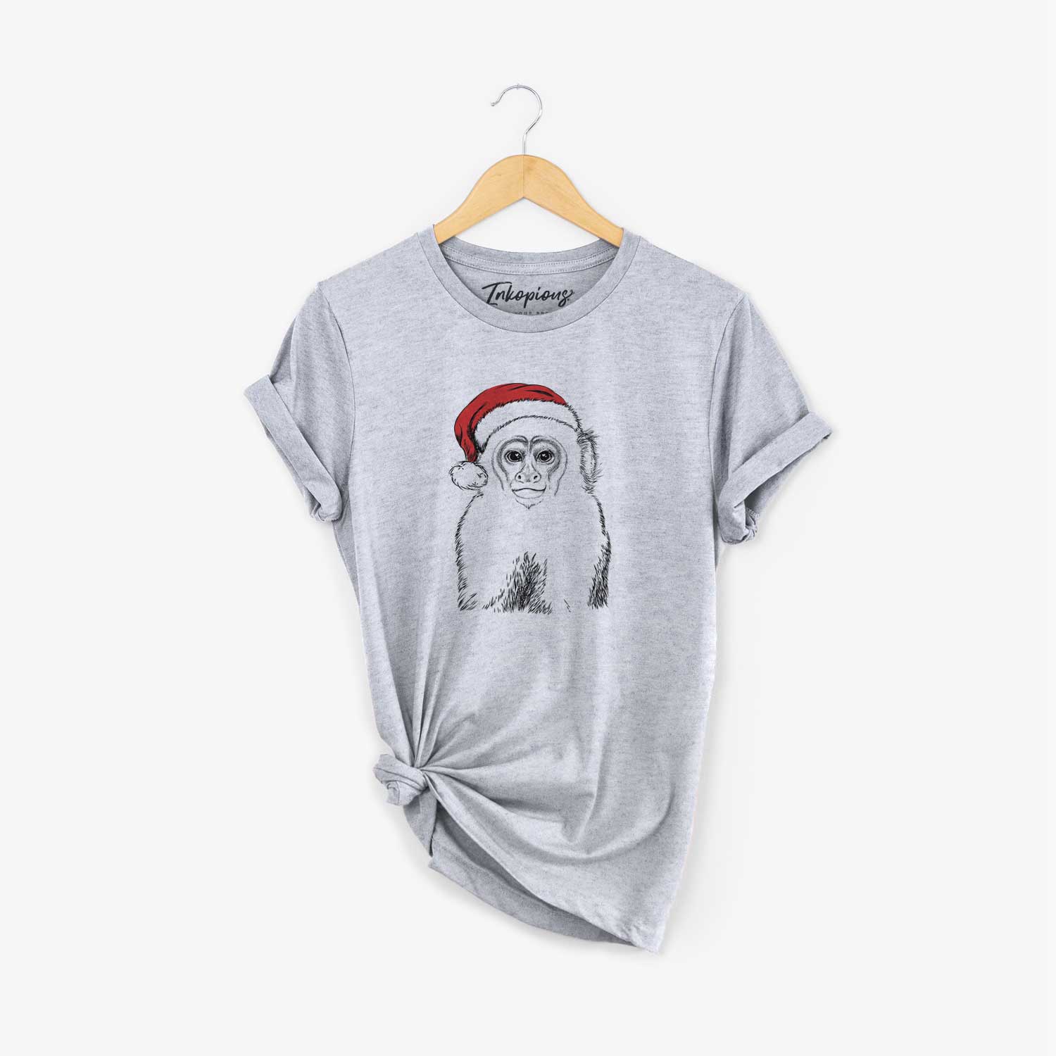 Hand-drawn sketch of Marcel the Capuchin Monkey wearing a Santa hat on a Grey Unisex crewneck