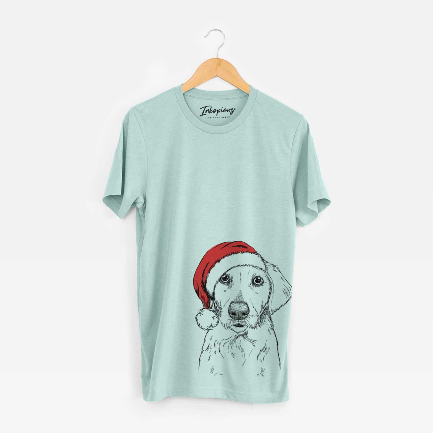 Hand-drawn sketch of Marley Sue the Labradoodle wearing a Santa hat on a Heather Sage Unisex crewneck