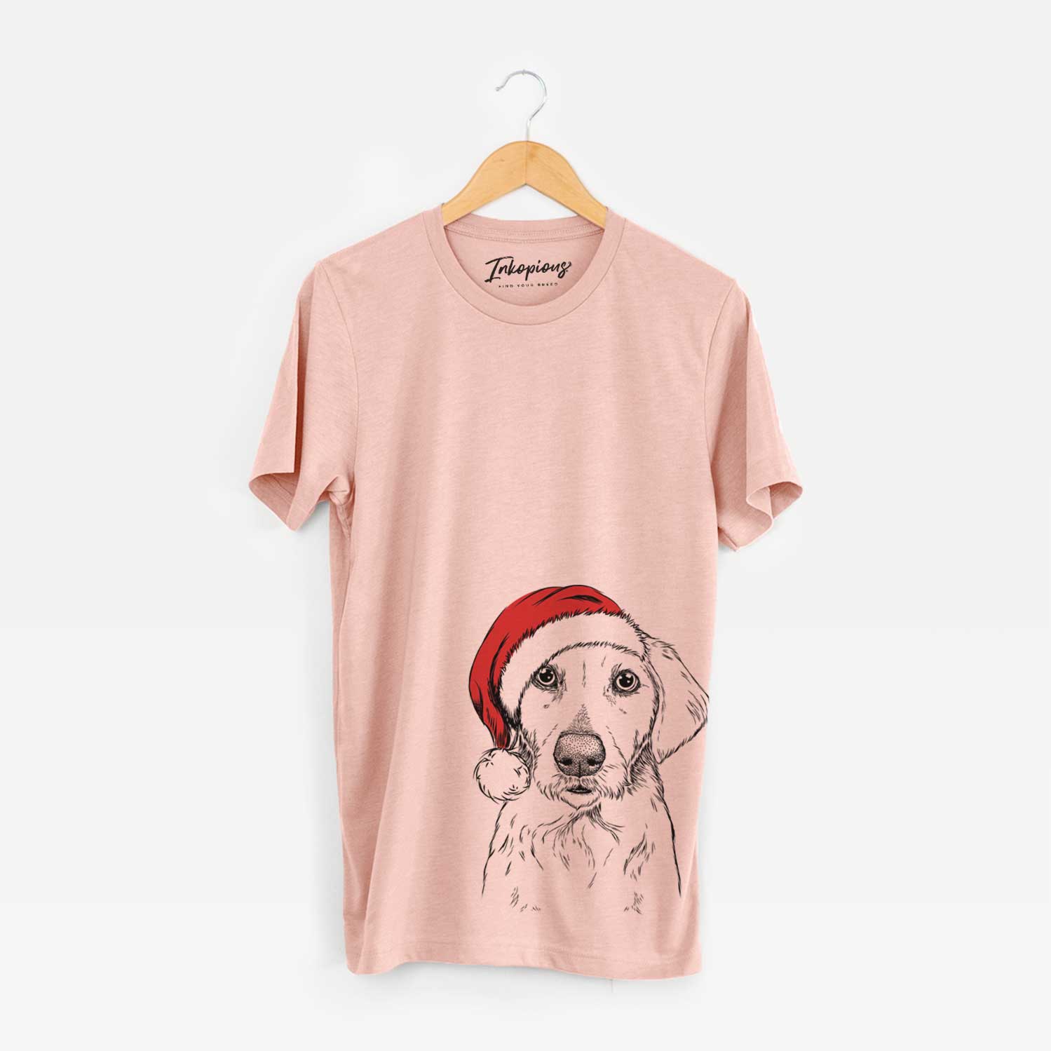 Hand-drawn sketch of Marley Sue the Labradoodle wearing a Santa hat on a Peach Unisex crewneck
