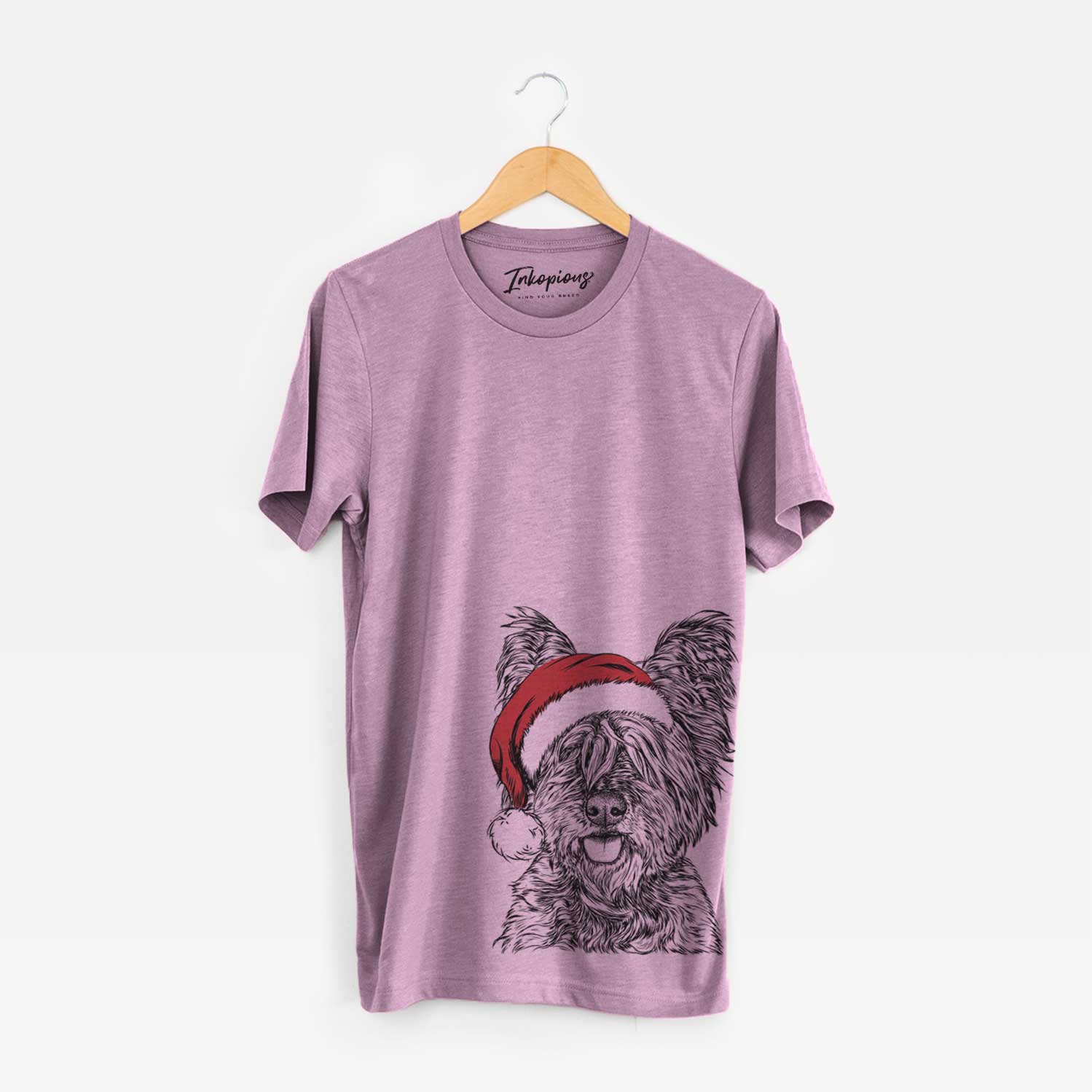 Hand-drawn sketch of McDuff the Cairn Terrier wearing a Santa hat on an Orchid Unisex crewneck