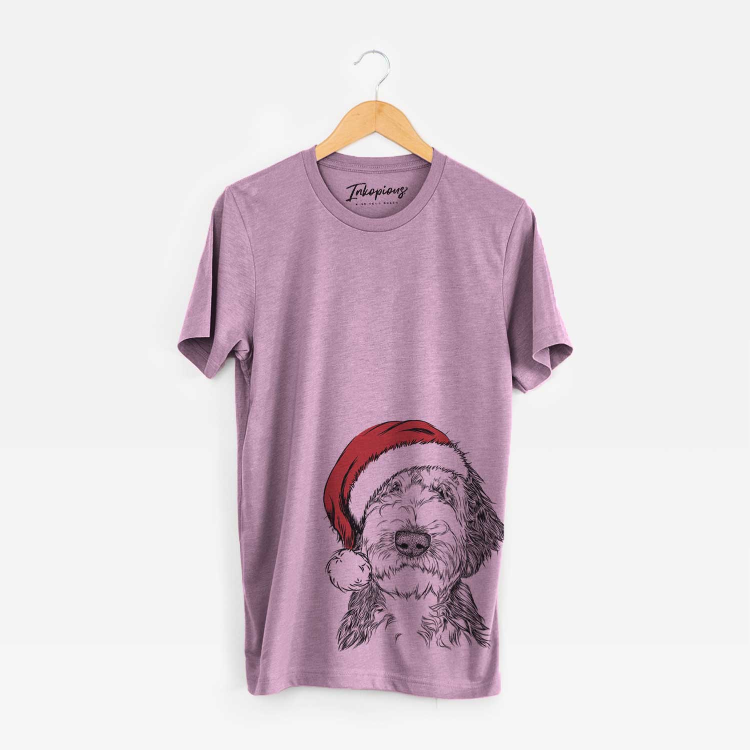 Hand-drawn sketch of Milo Fluff the Sheepadoodle wearing a Santa hat on an Orchid Unisex crewneck