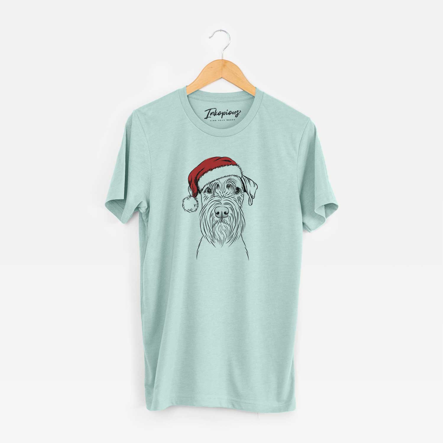 Hand-drawn sketch of Milton the Schnauzer wearing a Santa hat on a Heather Sage Unisex crewneck