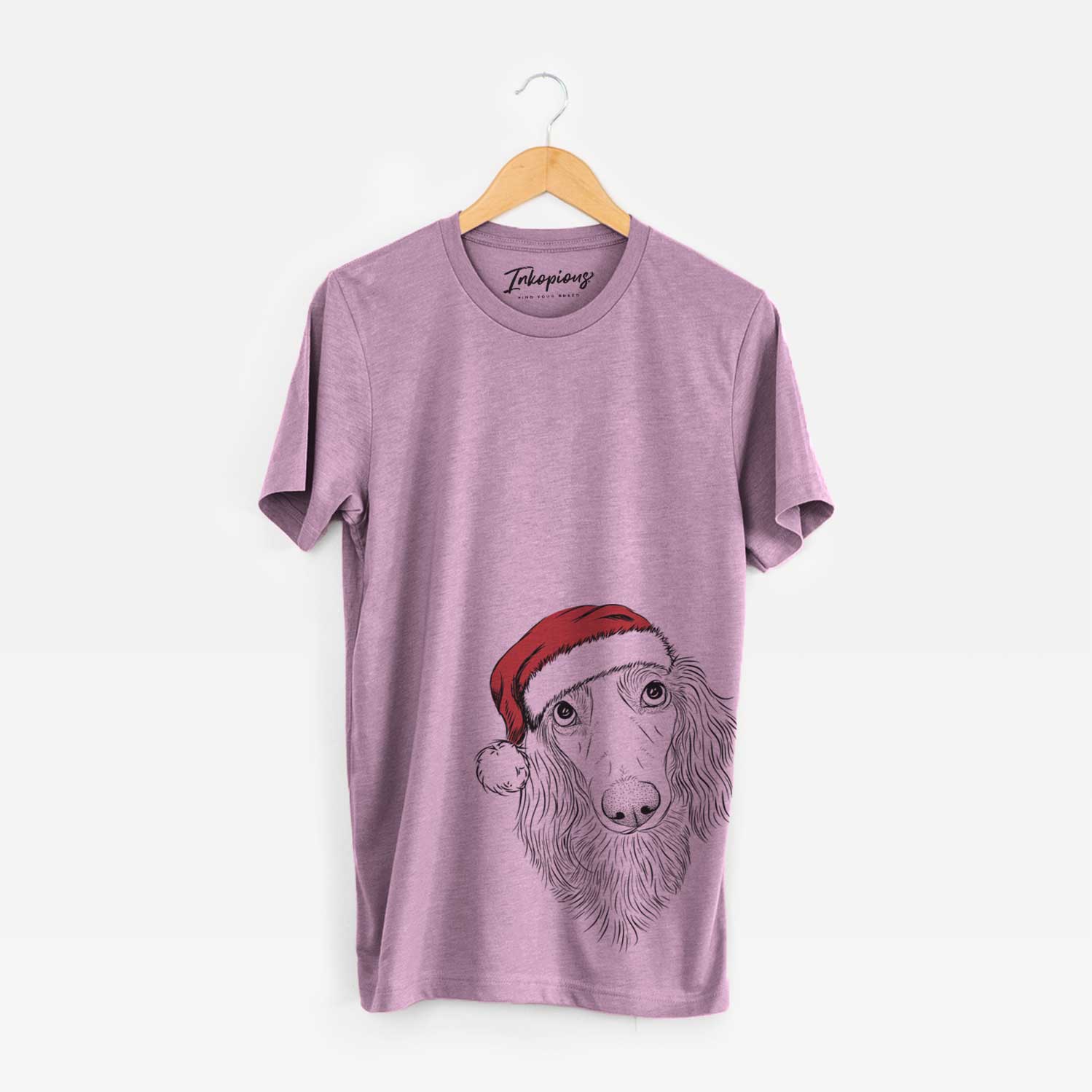 Hand-drawn sketch of Mr. Rusty the Long Haired Dachshund wearing a Santa hat on an Orchid Unisex crewneck