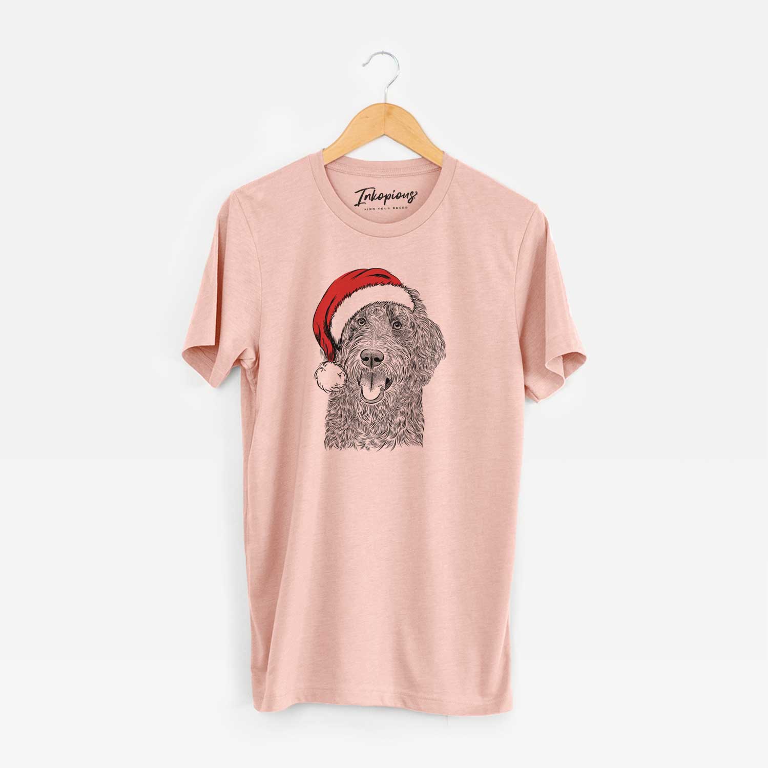 Hand-drawn sketch of Murr Dog the Labradoodle wearing a Santa hat on a Peach Unisex crewneck