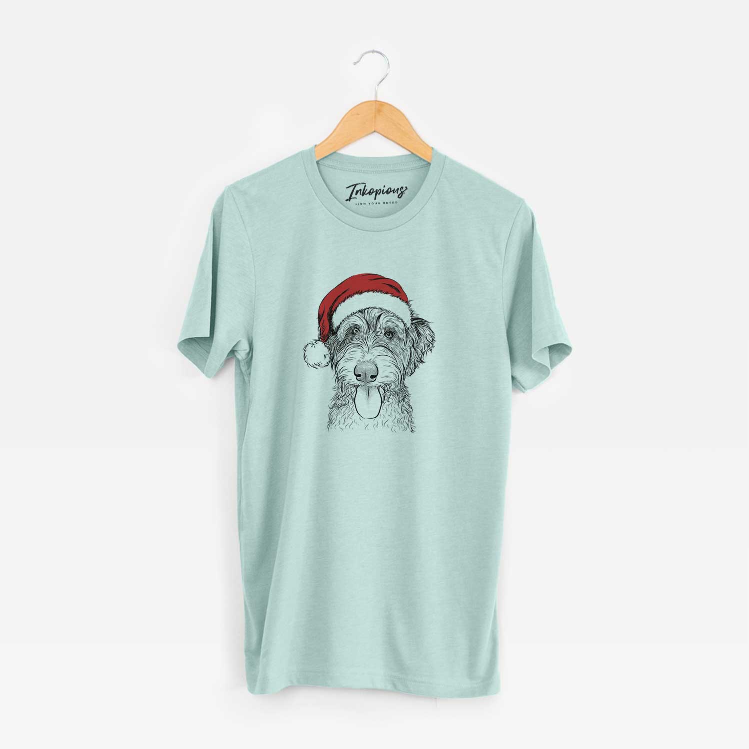 Hand-drawn sketch of Myrtle Mae the Aussiedoodle wearing a Santa hat on a Heather Sage Unisex crewneck