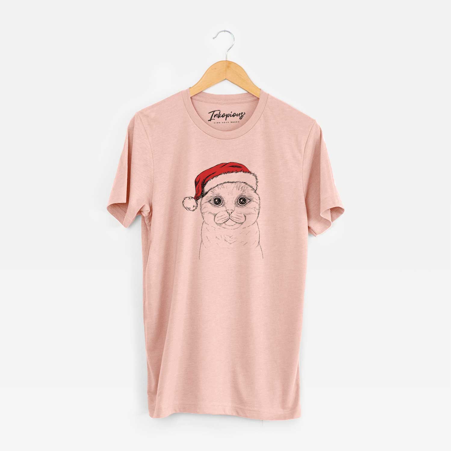 Hand-drawn sketch of Neko the Scottish Fold Cat wearing a Santa hat on a Peach Unisex crewneck