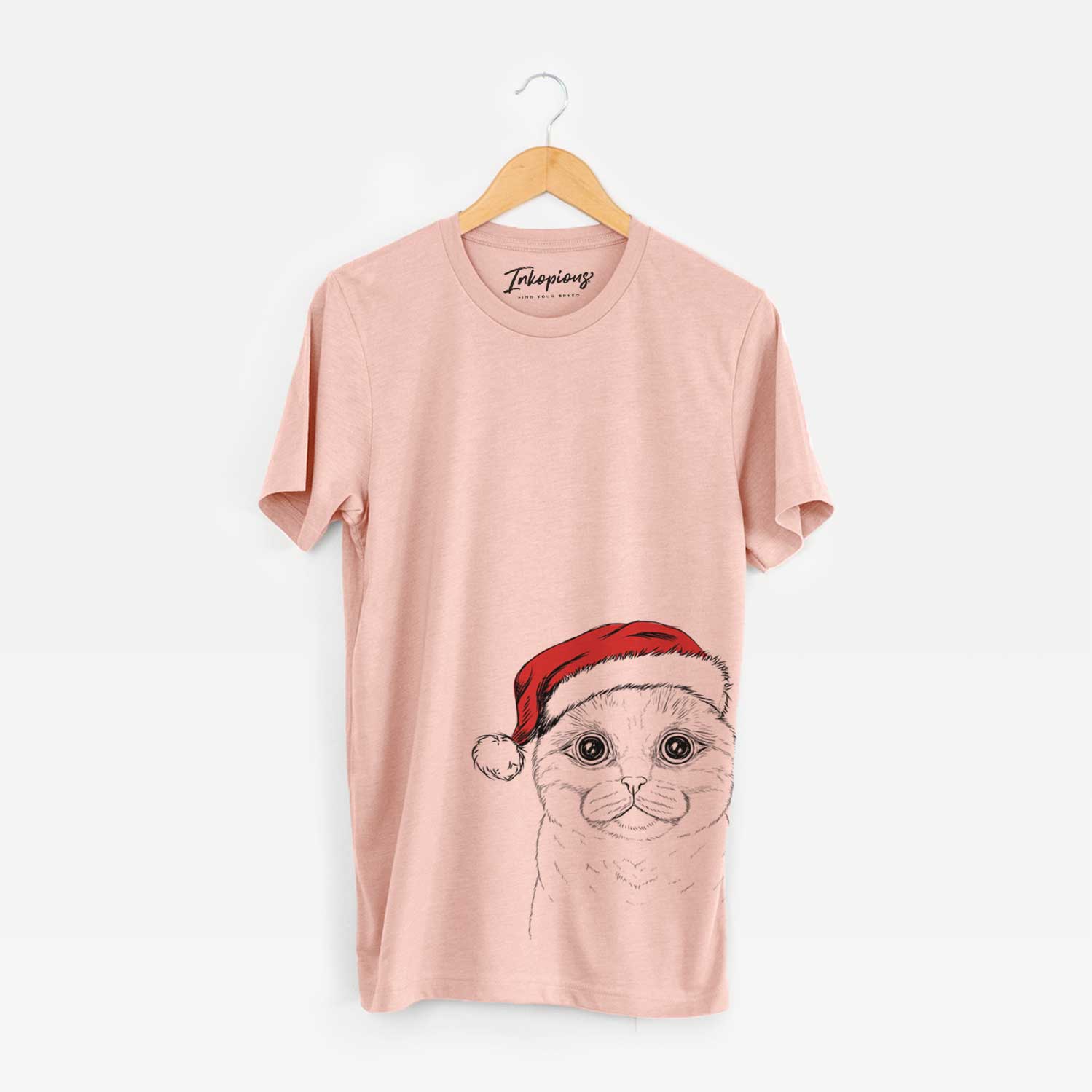 Hand-drawn sketch of Neko the Scottish Fold Cat wearing a Santa hat on a Peach Unisex crewneck
