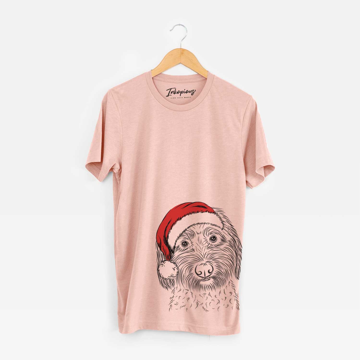Hand-drawn sketch of Niles the Soft Coated Wheaten Terrier wearing a Santa hat on a Peach Unisex crewneck