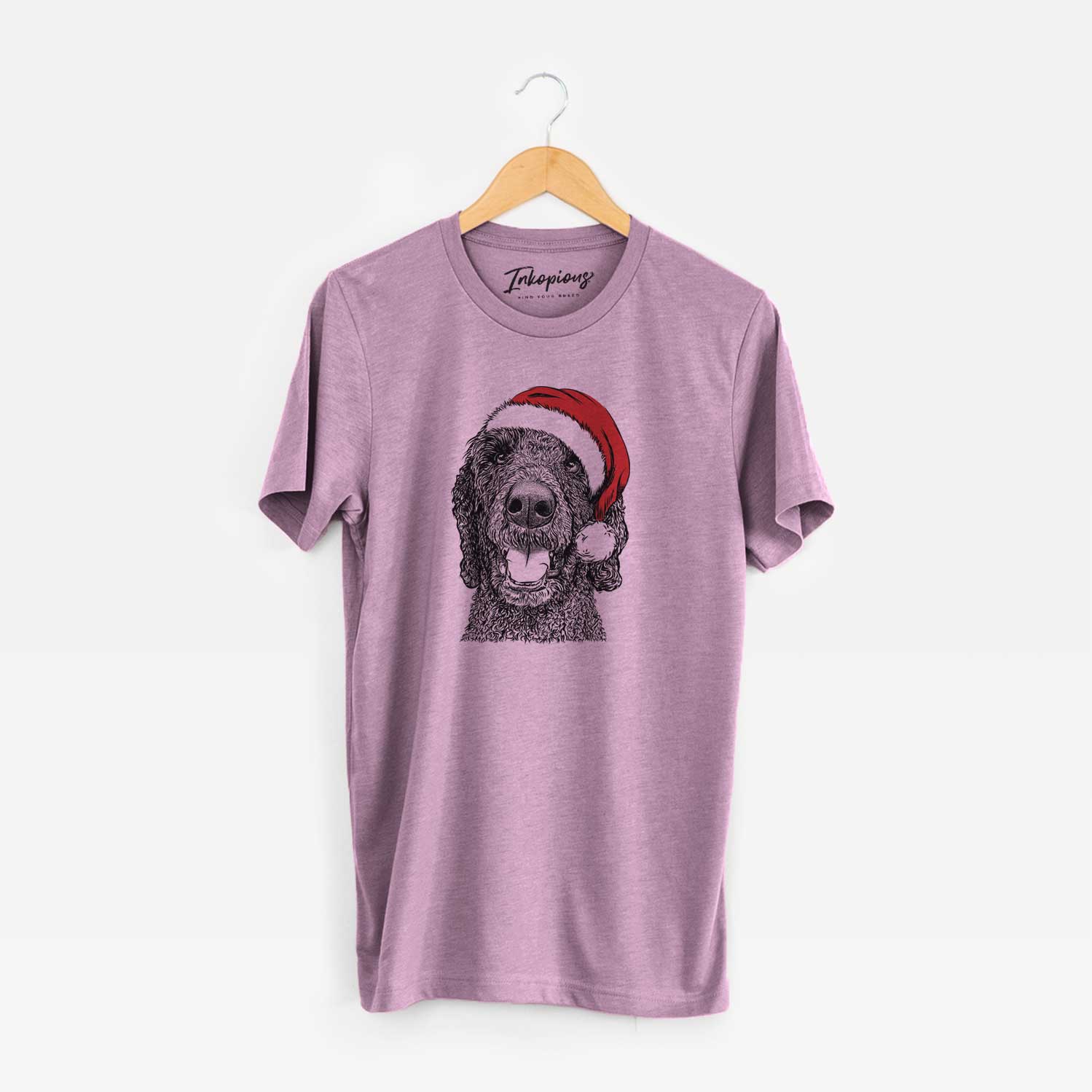 Hand-drawn sketch of Obi James the Goldendoodle wearing a Santa hat on an Orchid Unisex crewneck