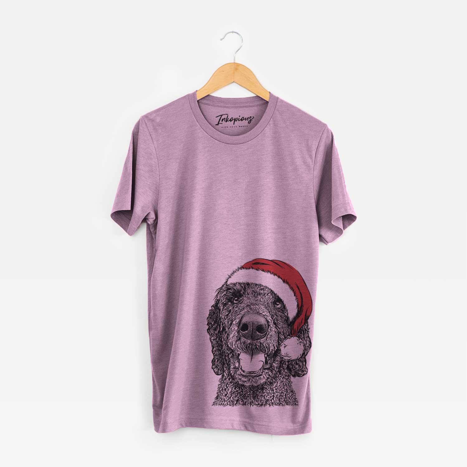 Hand-drawn sketch of Obi James the Goldendoodle wearing a Santa hat on an Orchid Unisex crewneck