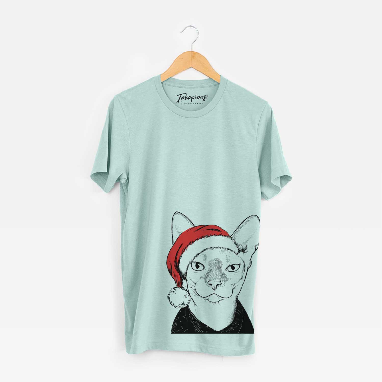 Hand-drawn sketch of Oliver Watson the Sphynx Cat wearing a Santa hat on a Heather Sage Unisex crewneck