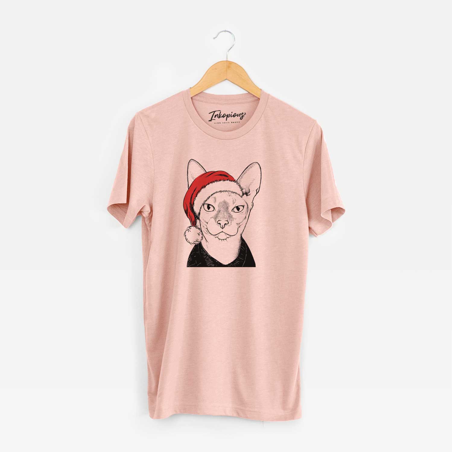Hand-drawn sketch of Oliver Watson the Sphynx Cat wearing a Santa hat on a Peach Unisex crewneck