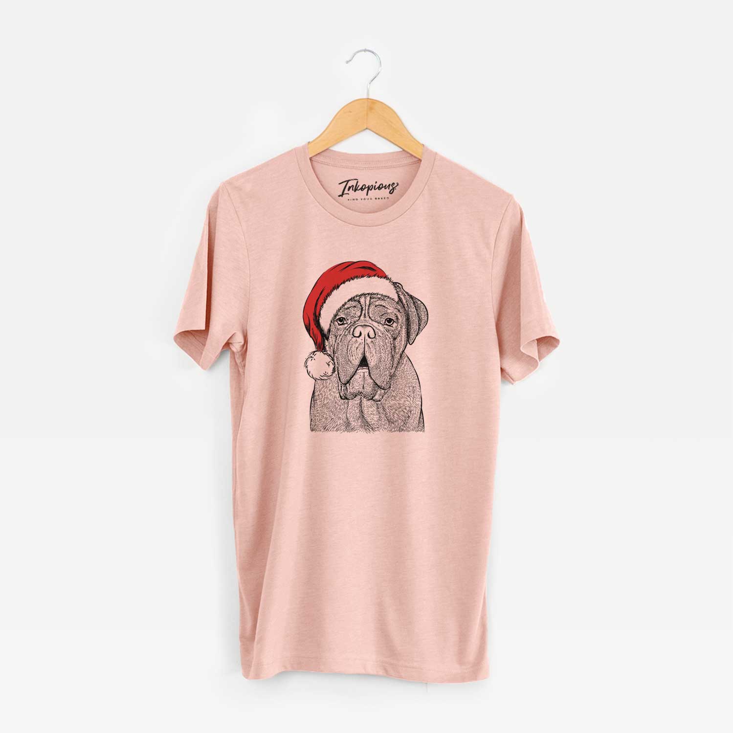 Hand-drawn sketch of Optimus the Dogue de Bordeaux wearing a Santa hat on a Peach Unisex crewneck