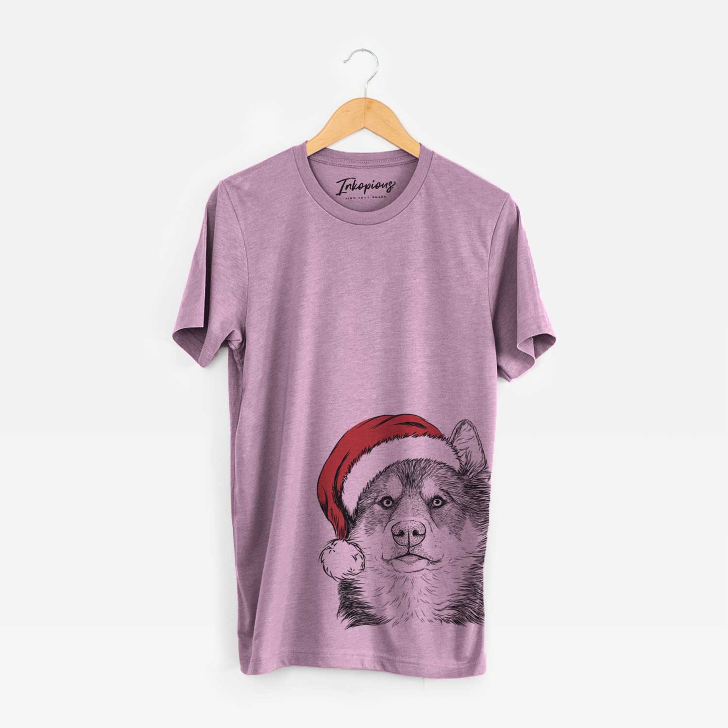 Hand-drawn sketch of Oskar the Canadian Eskimo Dog wearing a Santa hat on an Orchid Unisex crewneck
