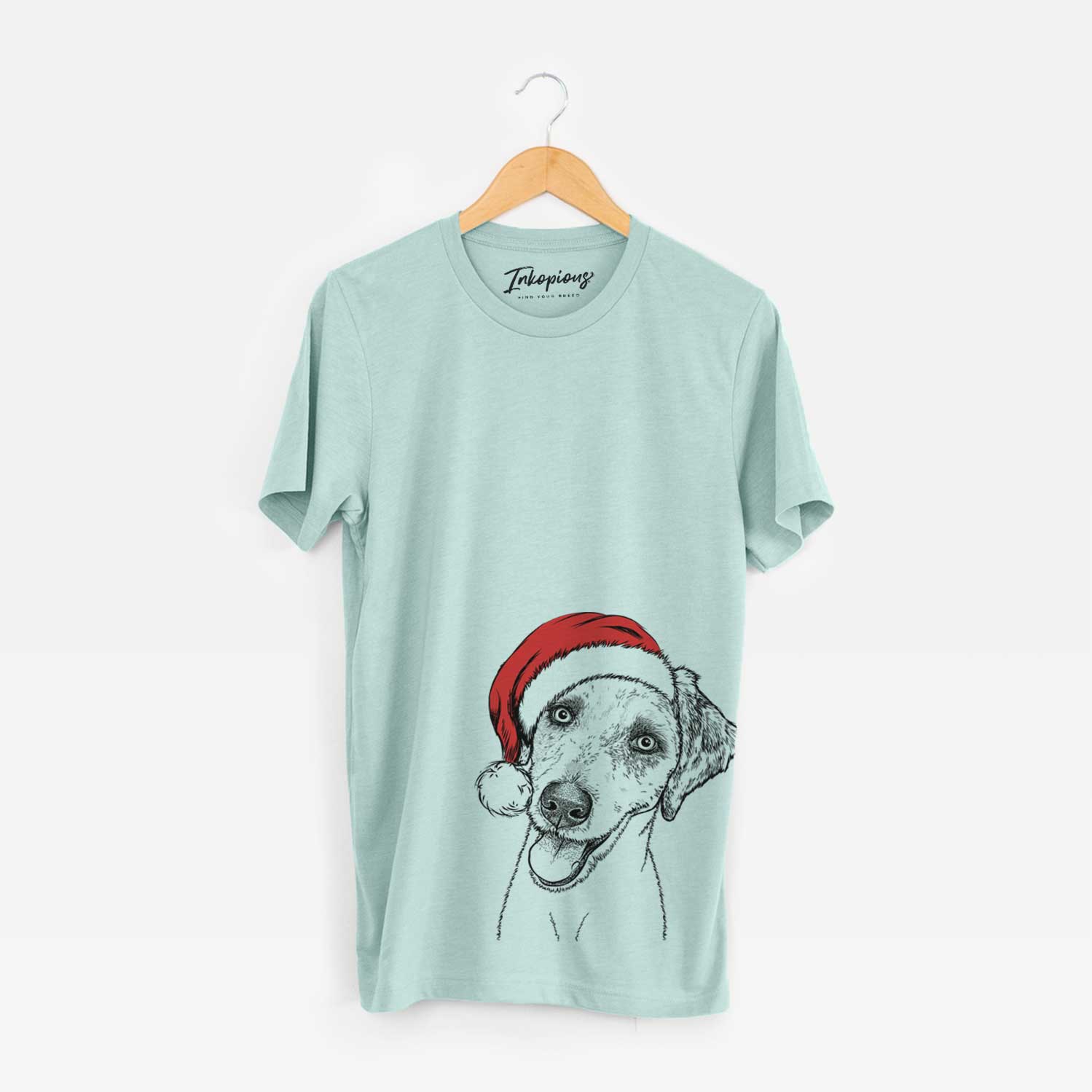 Hand-drawn sketch of Palm Palm the Aussiedoodle wearing a Santa hat on a Heather Sage Unisex crewneck