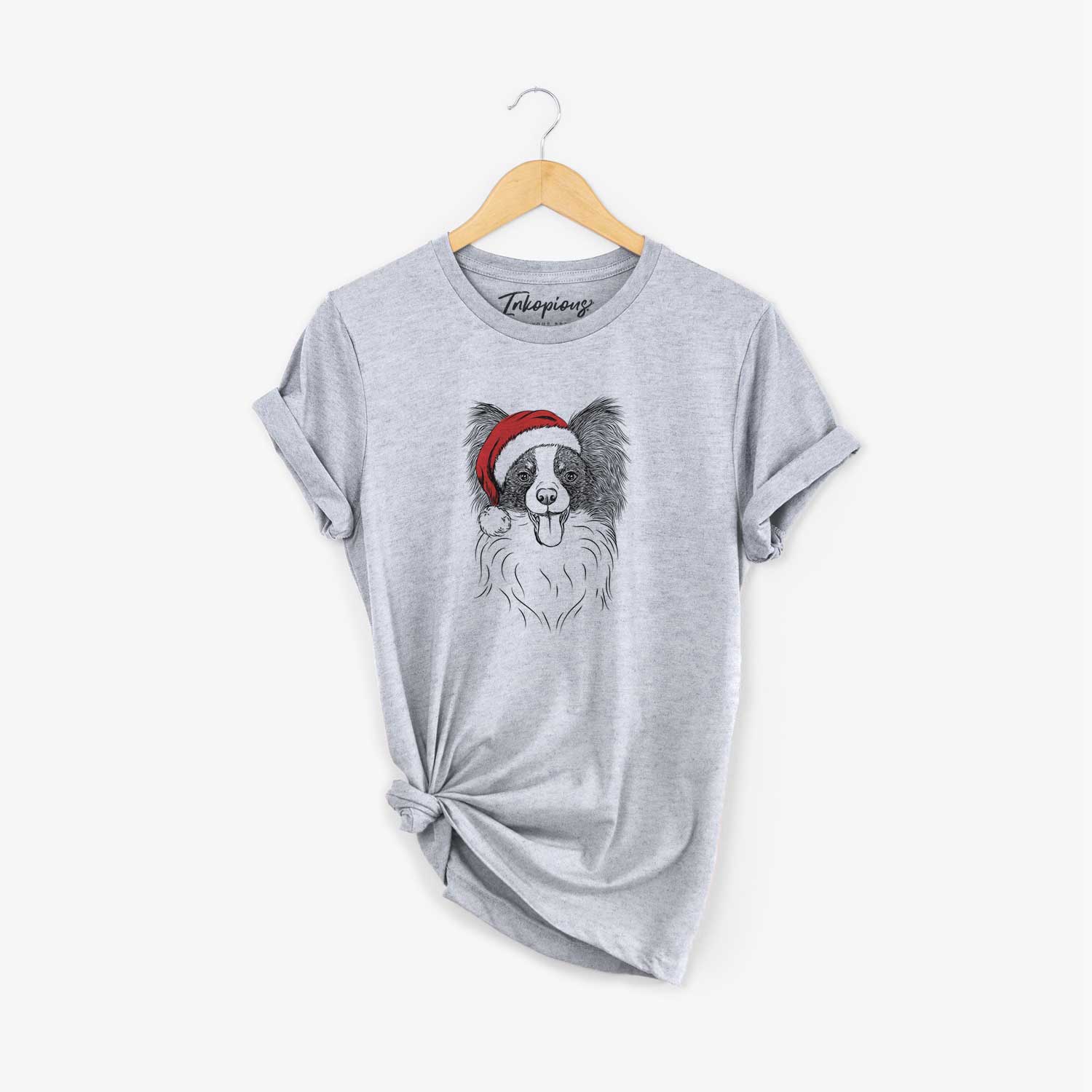 Hand-drawn sketch of Patrick the Papillon wearing a Santa hat on a Grey Unisex crewneck