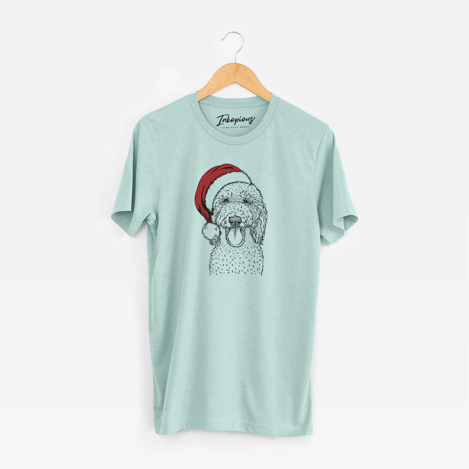 Hand-drawn sketch of Pavlov the Goldendoodle wearing a Santa hat on a Heather Sage Unisex crewneck