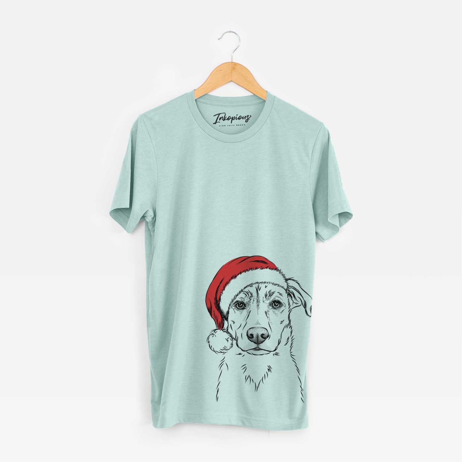 Hand-drawn sketch of Peanut the Lab Mix wearing a Santa hat on a Heather Sage Unisex crewneck