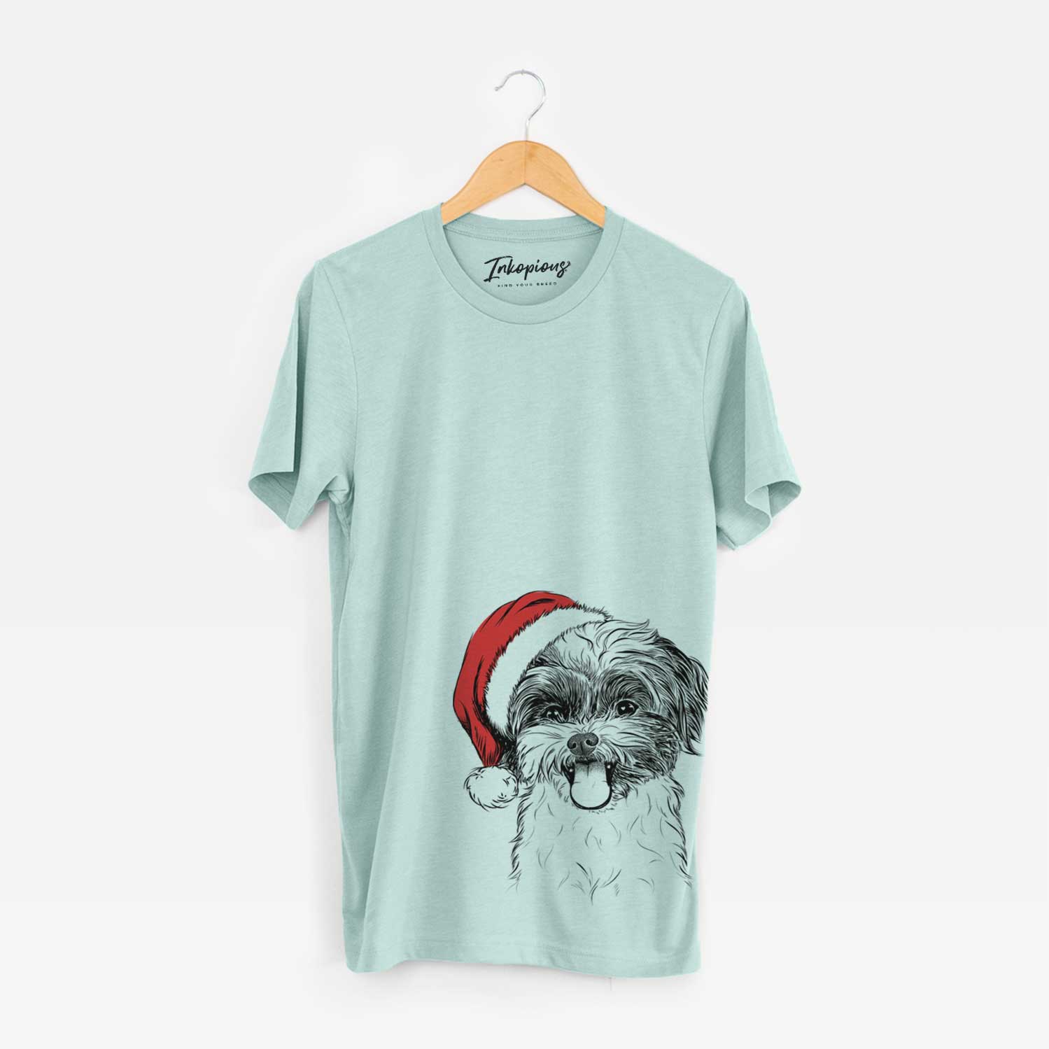Hand-drawn sketch of Pepper the Shihpoo wearing a Santa hat on a Heather Sage Unisex crewneck