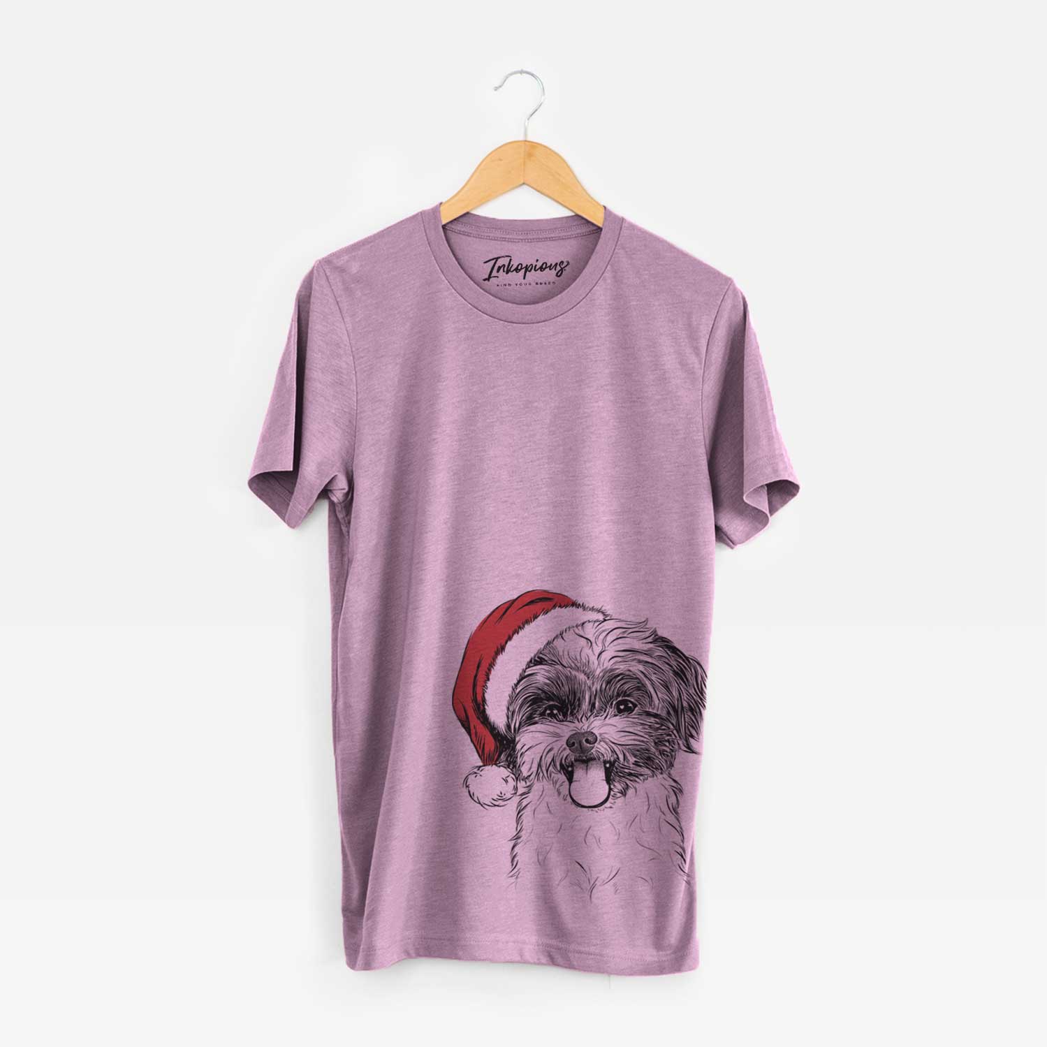 Hand-drawn sketch of Pepper the Shihpoo wearing a Santa hat on an Orchid Unisex crewneck