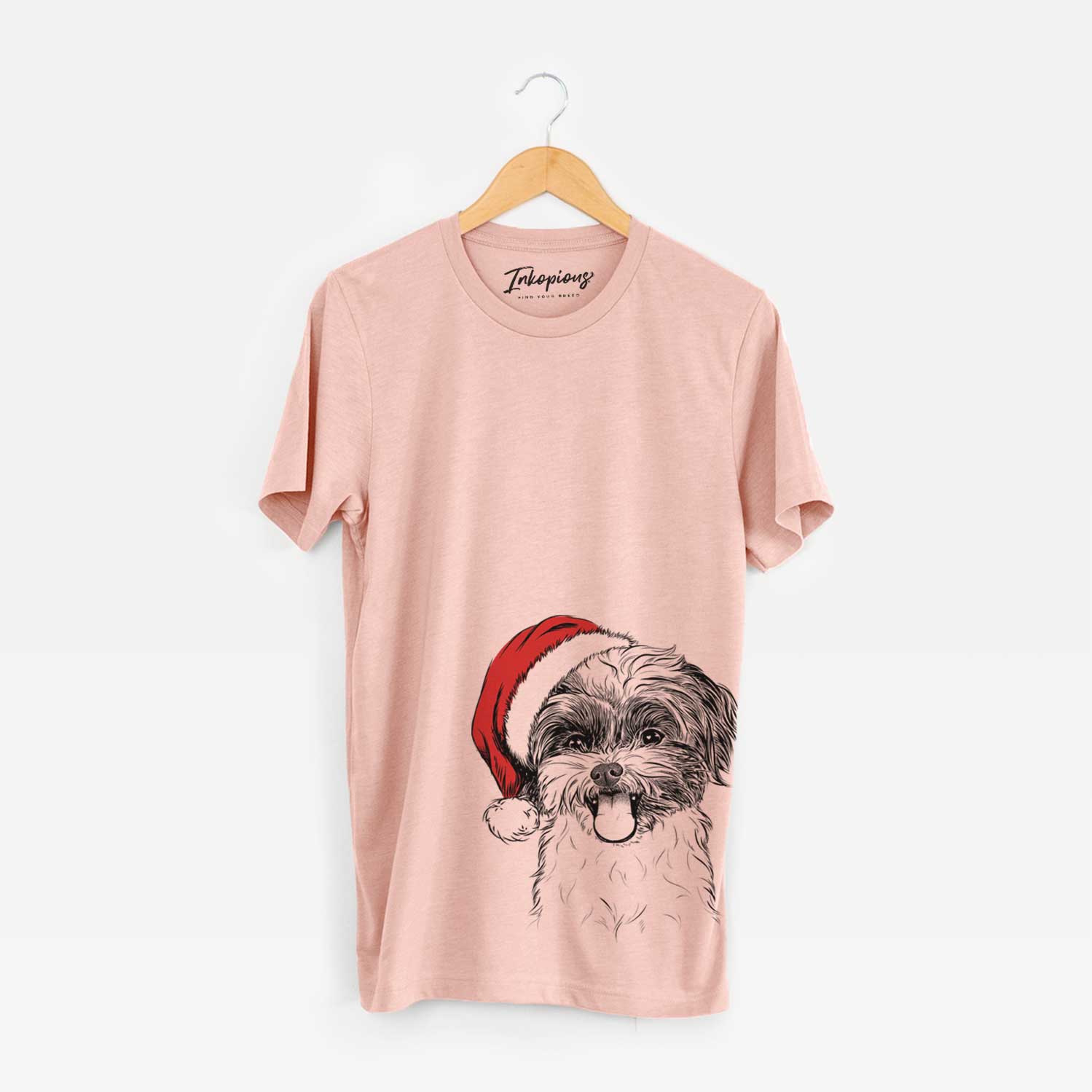 Hand-drawn sketch of Pepper the Shihpoo wearing a Santa hat on a Peach Unisex crewneck