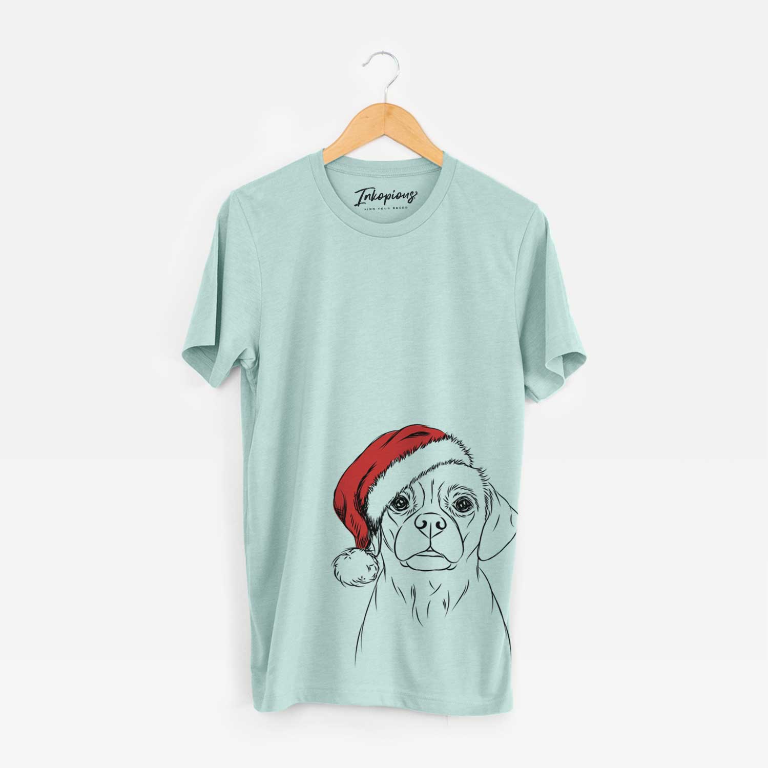Hand-drawn sketch of Popcorn the Puggle wearing a Santa hat on a Heather Sage Unisex crewneck