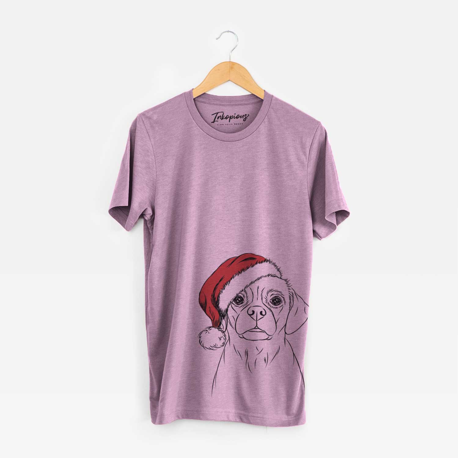 Hand-drawn sketch of Popcorn the Puggle wearing a Santa hat on an Orchid Unisex crewneck