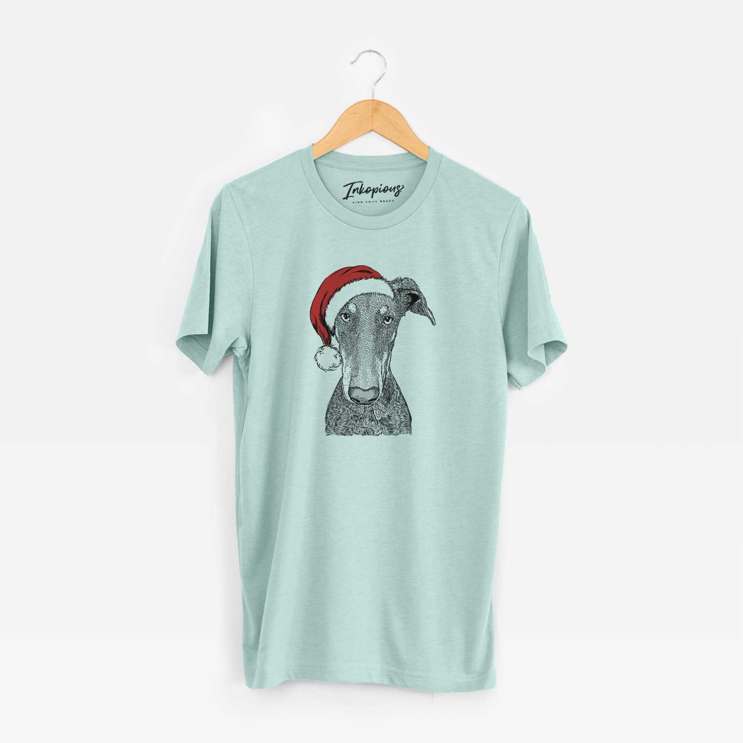 Hand-drawn sketch of Princess Fiona the Doberman Pinscher wearing a Santa hat on a Heather Sage Unisex crewneck