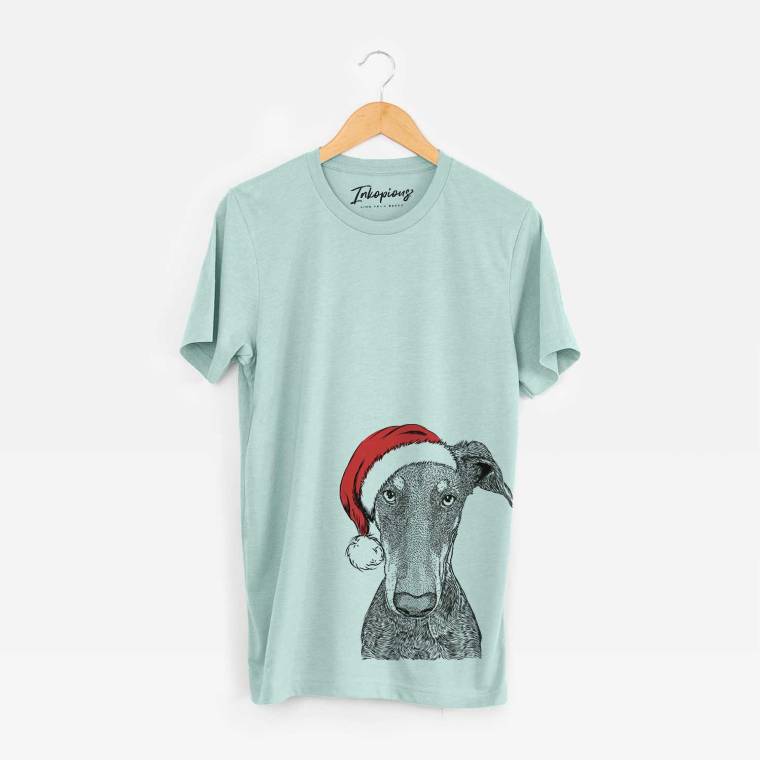 Hand-drawn sketch of Princess Fiona the Doberman Pinscher wearing a Santa hat on a Heather Sage Unisex crewneck