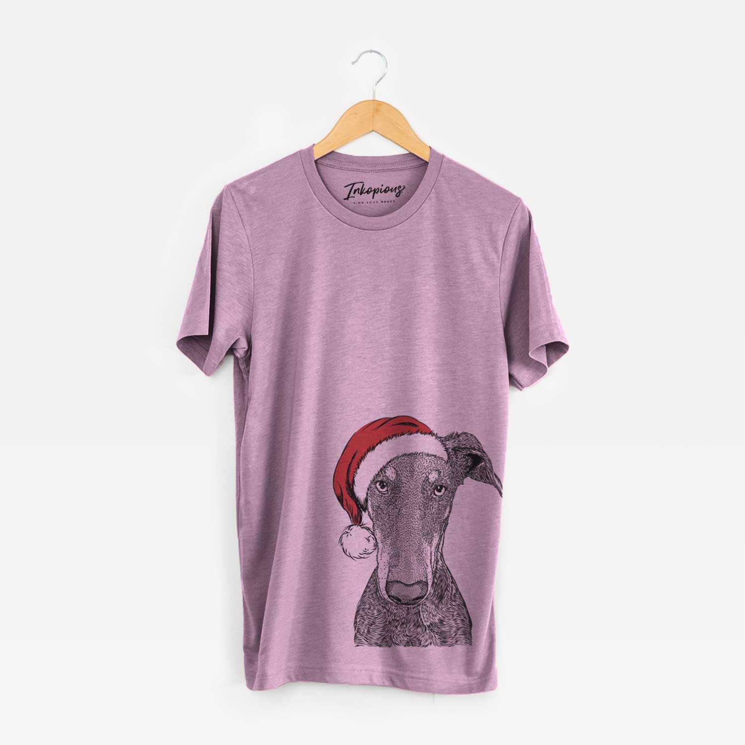 Hand-drawn sketch of Princess Fiona the Doberman Pinscher wearing a Santa hat on an Orchid Unisex crewneck
