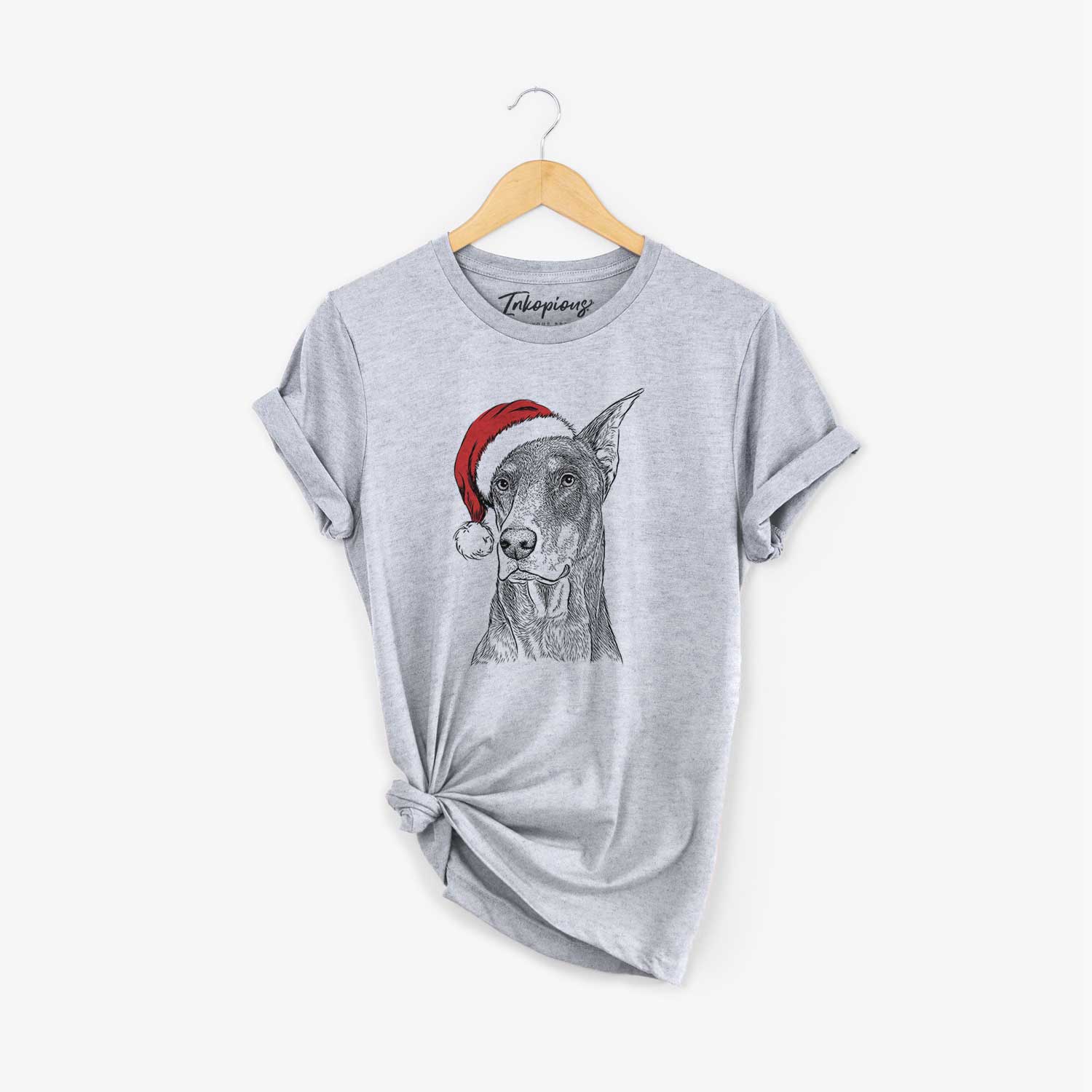 Hand-drawn sketch of RJ the Doberman Pinscher wearing a Santa hat on a Grey Unisex crewneck